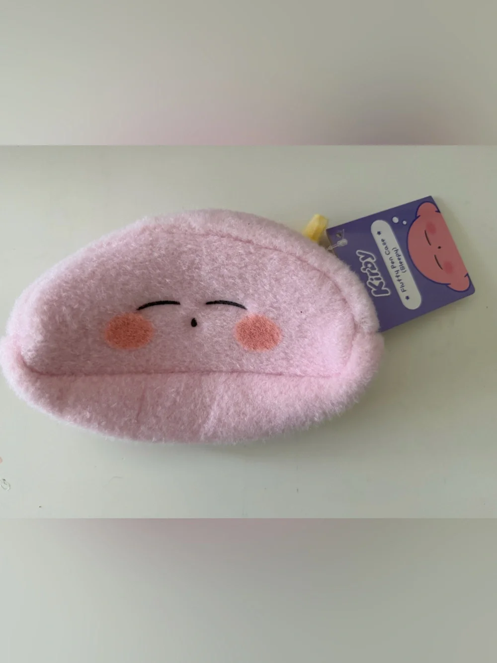 Kirby plush, purse and pencils case $45